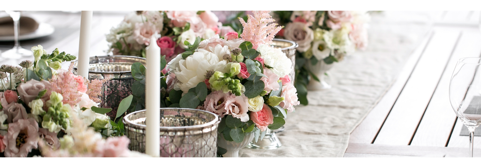 pink and white rose floral centerpieces with soft greenery 